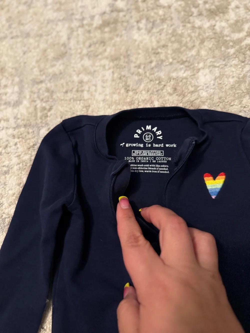 Primary Navy Footed One-Piece with Rainbow Heart and Striped Cuffs size 6/9M